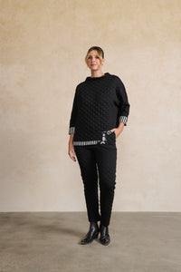 Quilted Asymmetrical Hem Top