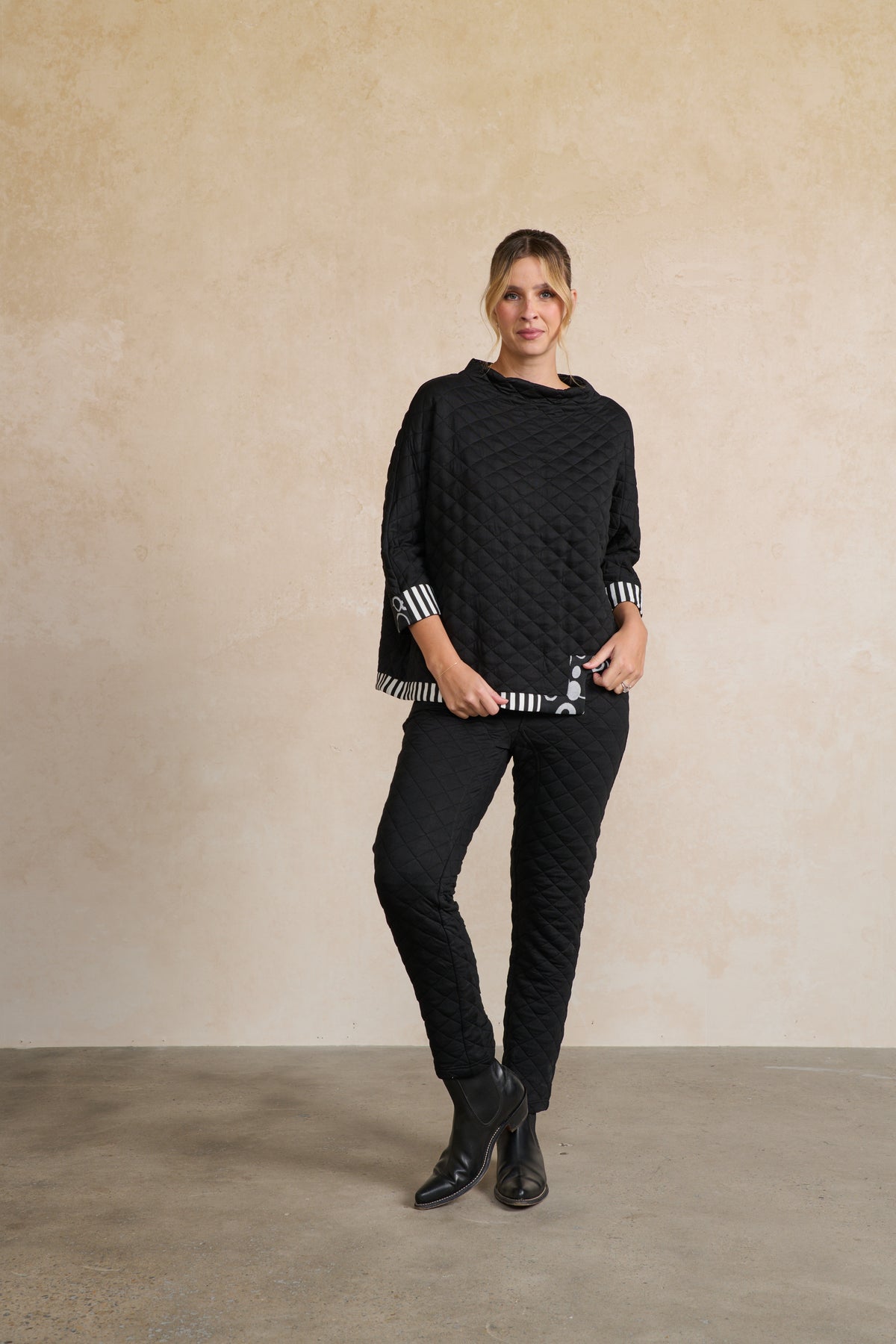 Quilted Asymmetrical Hem Top