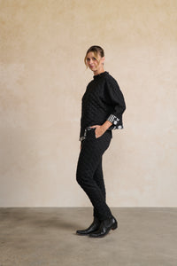 Quilted Asymmetrical Hem Top